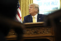 President Donald Trump listens as he meets with Chinese Vice Premier Liu He in the Oval Office of the White House in Washington, Friday, Oct. 11, 2019. (AP Photo/Andrew Harnik)