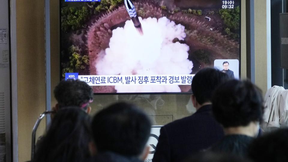 A TV screen shows a file image of North Korea's missile launch during a news program at the Seoul Railway Station in Seoul, South Korea, Wednesday, April 19, 2023. (AP Photo/Ahn Young-joon)
