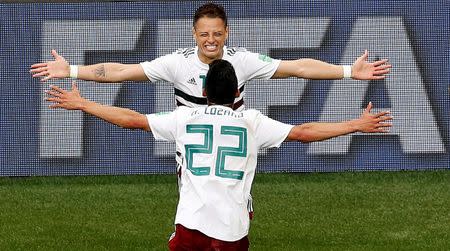 Soccer Football - World Cup - Group F - South Korea vs Mexico - Rostov Arena, Rostov-on-Don, Russia - June 23, 2018 Mexico's Javier Hernandez celebrates with Hirving Lozano after scoring their second goal REUTERS/Darren Staples