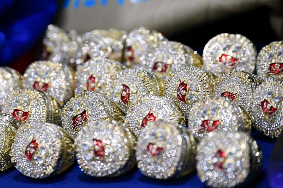 Counterfeit professional sports merchandise similar to these Tampa Bay Buccaneers Super Bowl rings seized in February as part of a case not tied to Delaware.