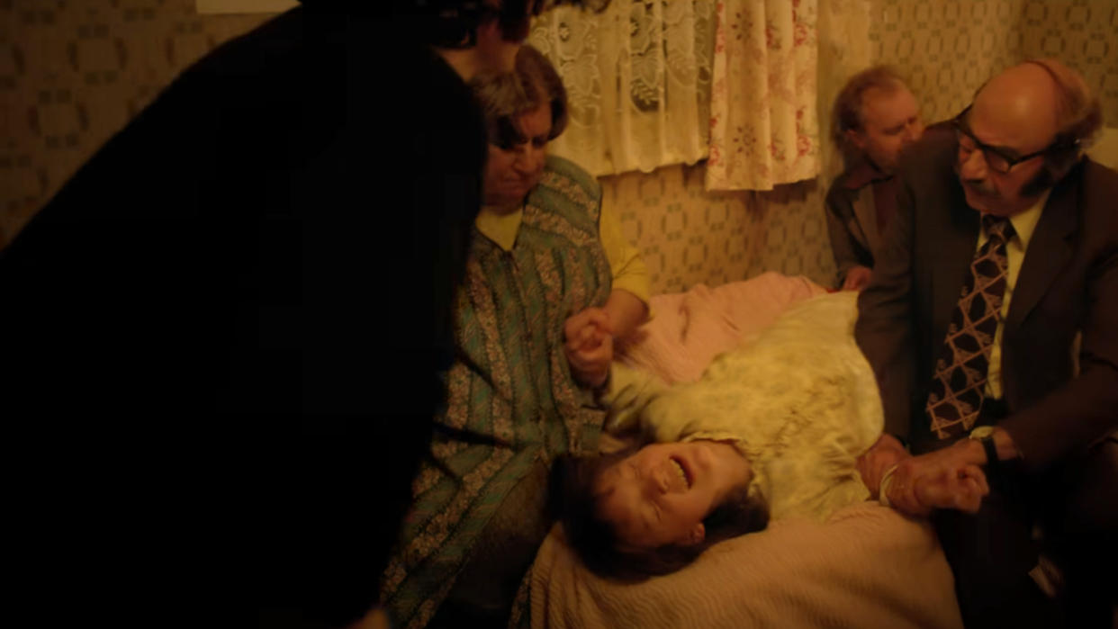  Actors recreate a scene from the original investigation on The Enfield Poltergeist. 