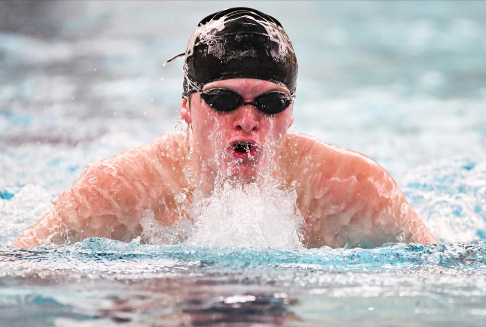 Edgewood’s Joshua Kohne competes in the 200 yard IM during their dual meet against Bloomington North at North on Tuesday, Jan. 23, 2024.
