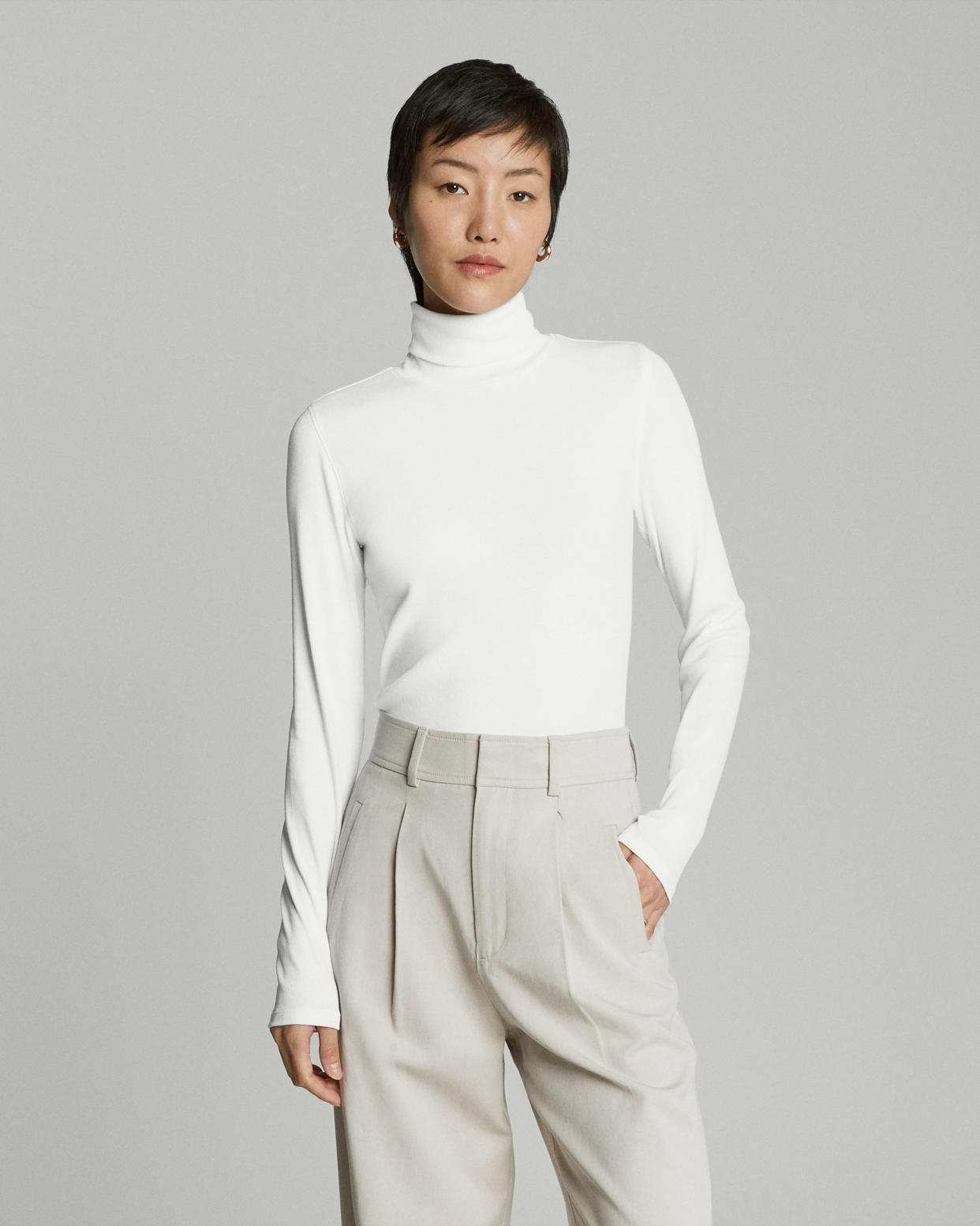 <p><a href="https://go.redirectingat.com?id=74968X1596630&url=https%3A%2F%2Fwww.everlane.com%2Fproducts%2Fwomens-supima-rib-turtleneck-white&sref=https%3A%2F%2Fwww.townandcountrymag.com%2Fstyle%2Ffashion-trends%2Fg39829385%2Fonly-murders-in-the-building-fashion%2F" rel="nofollow noopener" target="_blank" data-ylk="slk:Shop Now;elm:context_link;itc:0;sec:content-canvas" class="link rapid-noclick-resp">Shop Now</a></p><p>The Pima Micro-Rib Turtleneck</p><p>$50.00</p><p>everlane.com</p>