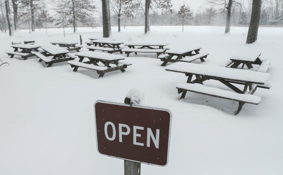 Ten picnic tables at Bellevue State Park mean no waiting as a snow storm hits the area, Friday afternoon, January 19, 2024.