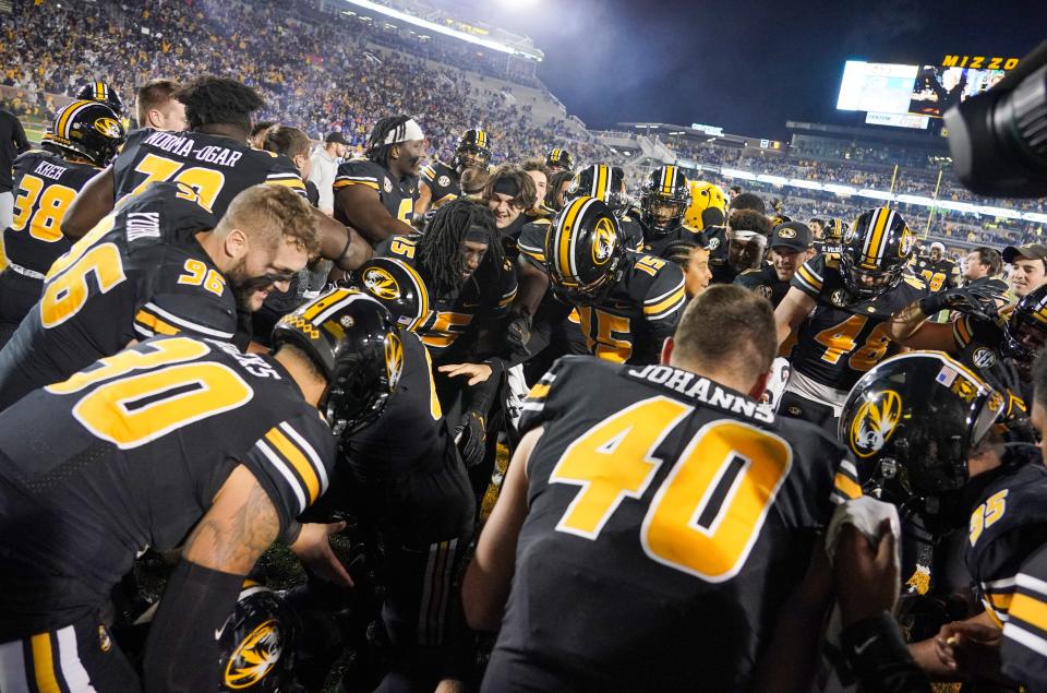 Missouri Tigers players celebrate after defeating the Florida Gators  in overtime Nov. 20 at Faurot Field to become bowl eligible.