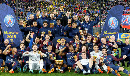 Soccer Football - Coupe de la Ligue Final - Paris St Germain vs AS Monaco - Matmut Atlantique Stadium, Bordeaux, France - March 31, 2018 Paris Saint-Germain players celebrate with the trophy after victory REUTERS/Regis Duvignau