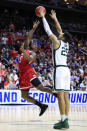 <p>Darrell Brown #5 of the Bradley Braves throws up a shot against Kenny Goins #25 of the Michigan State Spartans during their game in the First Round of the NCAA Basketball Tournament at Wells Fargo Arena on March 21, 2019 in Des Moines, Iowa. (Photo by Andy Lyons/Getty Images) </p>