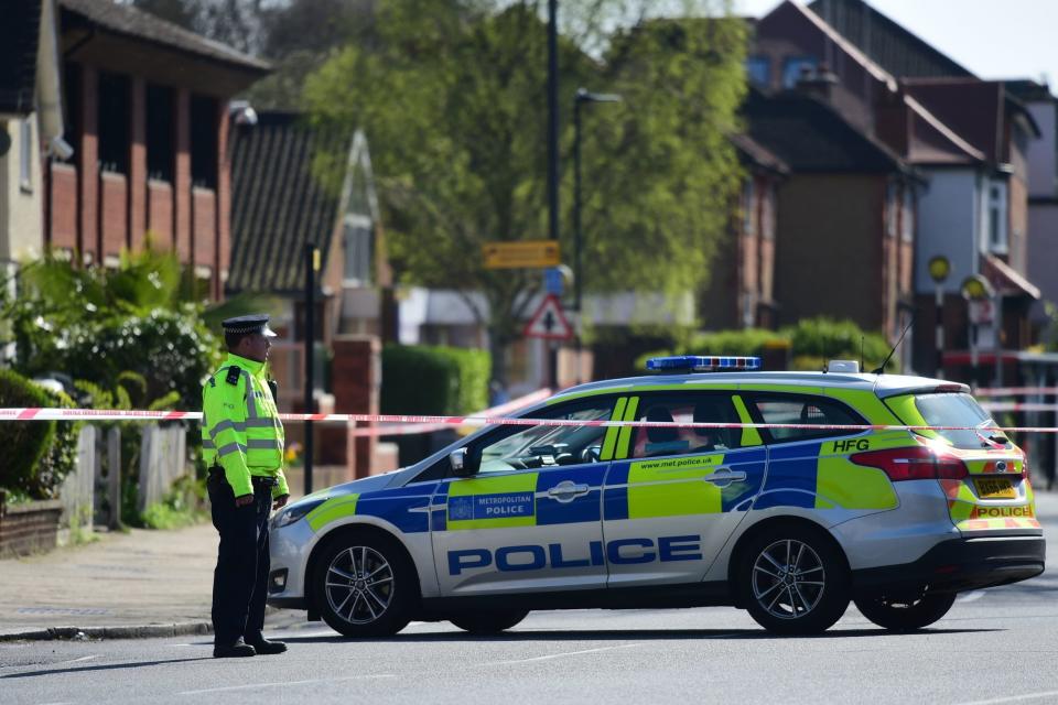 Police believe the victim a shop worker who was violently attacked by a man carrying out a robbery (PA)