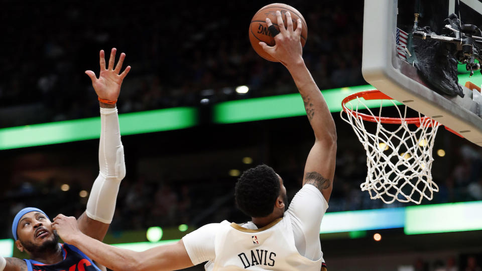 Anthony Davis rises above. (AP)