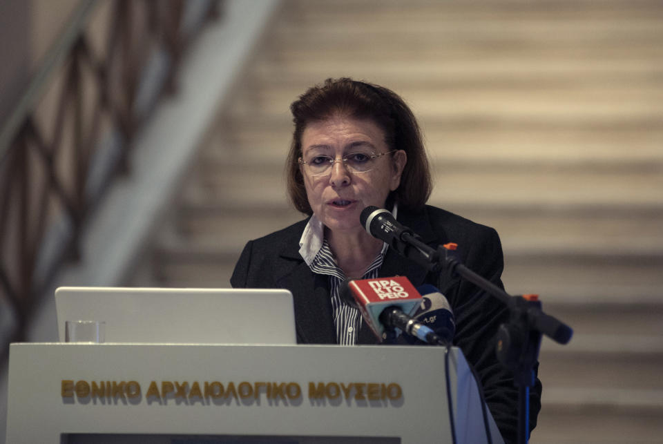 Greek Culture Minister Lina Mendoni speaks at the National Archaeological Museum in Athens on Wednesday, Nov. 13, 2019. Greece's Culture Ministry said Wednesday that an ancient vase which was one of the awards presented to Spyros Louis, the Greek winner of the Marathon in the 1896 first modern Olympic Games, has been returned to Athens by the University of Muenster in Germany where it had ended up.(AP Photo/Petros Giannakouris)