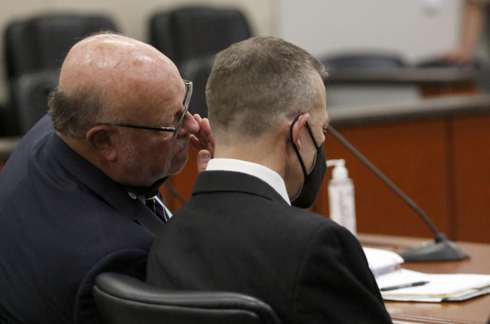 Paul Flores, right, listens after a jury found him guilty of murdering Cal Poly student Kristin Smart in Monterey County Superior Court on Tuesday, Oct. 18, 2022, in Salinas, Calif. Jurors unanimously found Flores guilty of first-degree murder. (Laura Dickinson/The Tribune via AP, Pool)