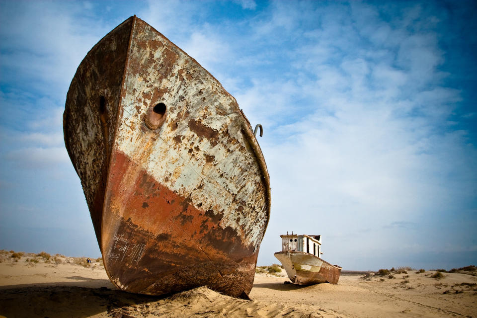 Rusting ships around the Aral Sea, which lies between Kazakhstan and Uzbekistan. It was once the world's fourth-largest lake, but overextraction of water to irrigate cotton crops has shrunk the Aral Sea by more than 90%. (Photo: Kelly Cheng Travel Photography via Getty Images)