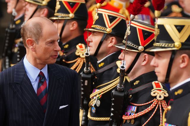 <p>VICTORIA JONES/POOL/AFP via Getty</p> Prince Edward inspects France's Garde Republicaine as they took part in the Changing of the Guard at Buckingham Palace on Monday April 8, 2024