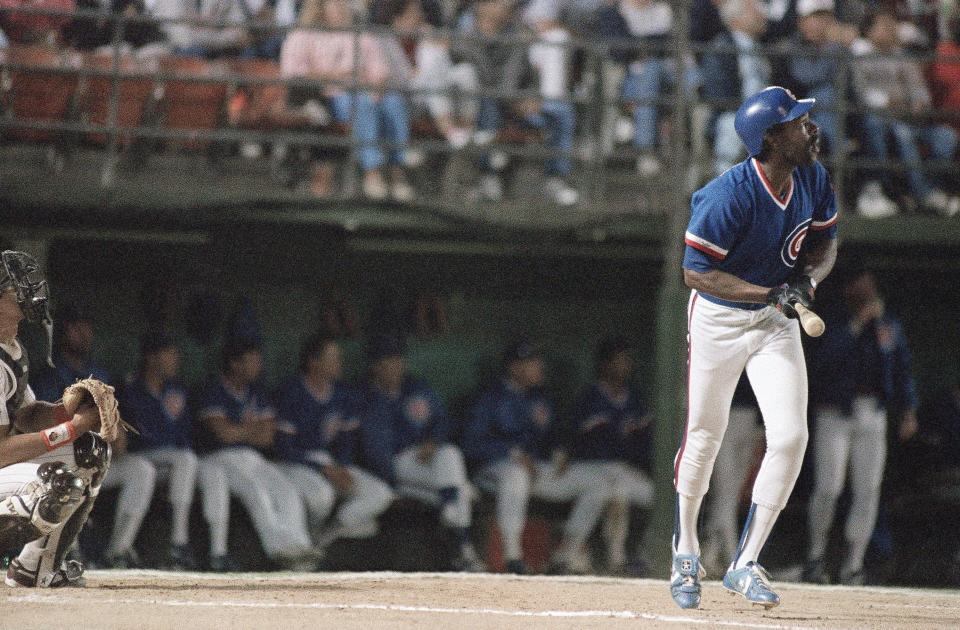 Chicago Cubs Andre Dawson pauses at homeplate to admire the flight of his second homerun of the night during the Cubs game against the Padres, Tuesday, May 3, 1988 in San Diego. Dawson doubled and homered twice in his first three trips to the plate and drove in five runs. (AP Photo/Ignelzi)