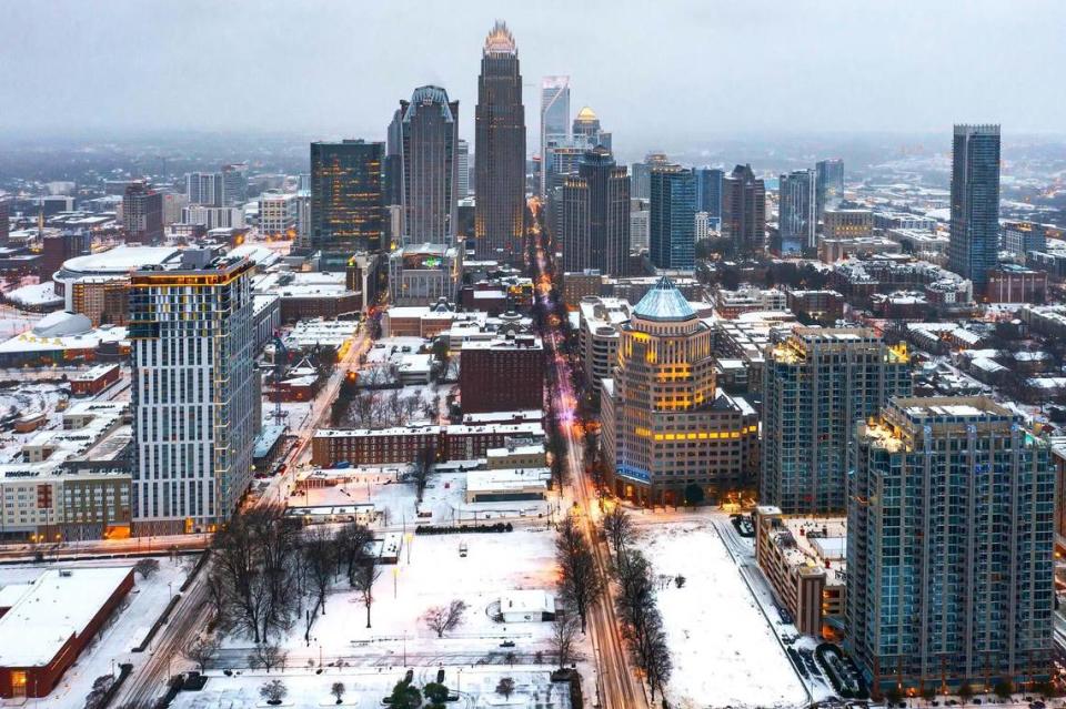 Snow blankets uptown Charlotte on Sunday morning, Jan. 16, 2020. 