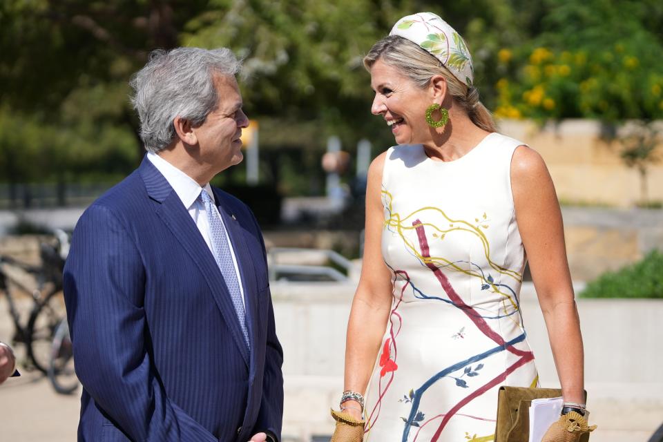 Queen Máxima of the Netherlands is greeted by Mayor Steve Adler at City Hall on Thursday.
