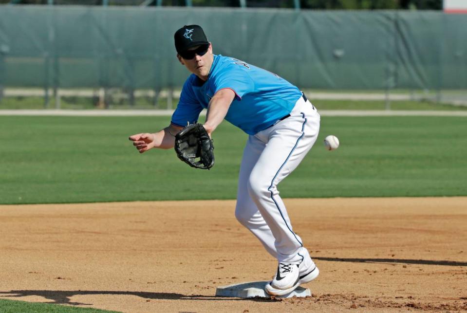 Miami Marlins third baseman Brian Anderson (15) run drills during the first full-squad spring training workout at Roger Dean Stadium on Monday, February 17, 2020 in Jupiter, FL.