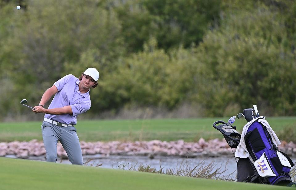 Watertown's Jake Olson chips to a green during the final round of the state Class AA high school boys golf tournament on Tuesday, Oct. 3, 2023 at the Brandon Golf Course. Olson finished with a two-day total of 7-under 135 to claim his second state title with a six-shot win.