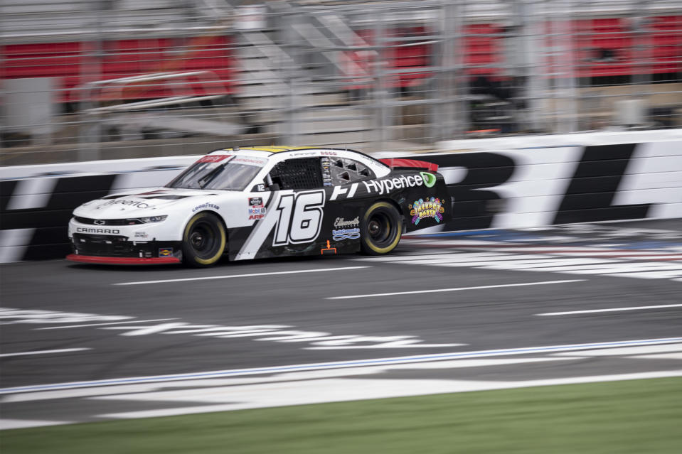 NASCAR Xfinity Series driver AJ Allmendinger (16) races during the NASCAR Xfinity auto racing race at the Charlotte Motor Speedway Saturday, Oct. 9, 2021, in Concord, N.C. (AP Photo/Matt Kelley)