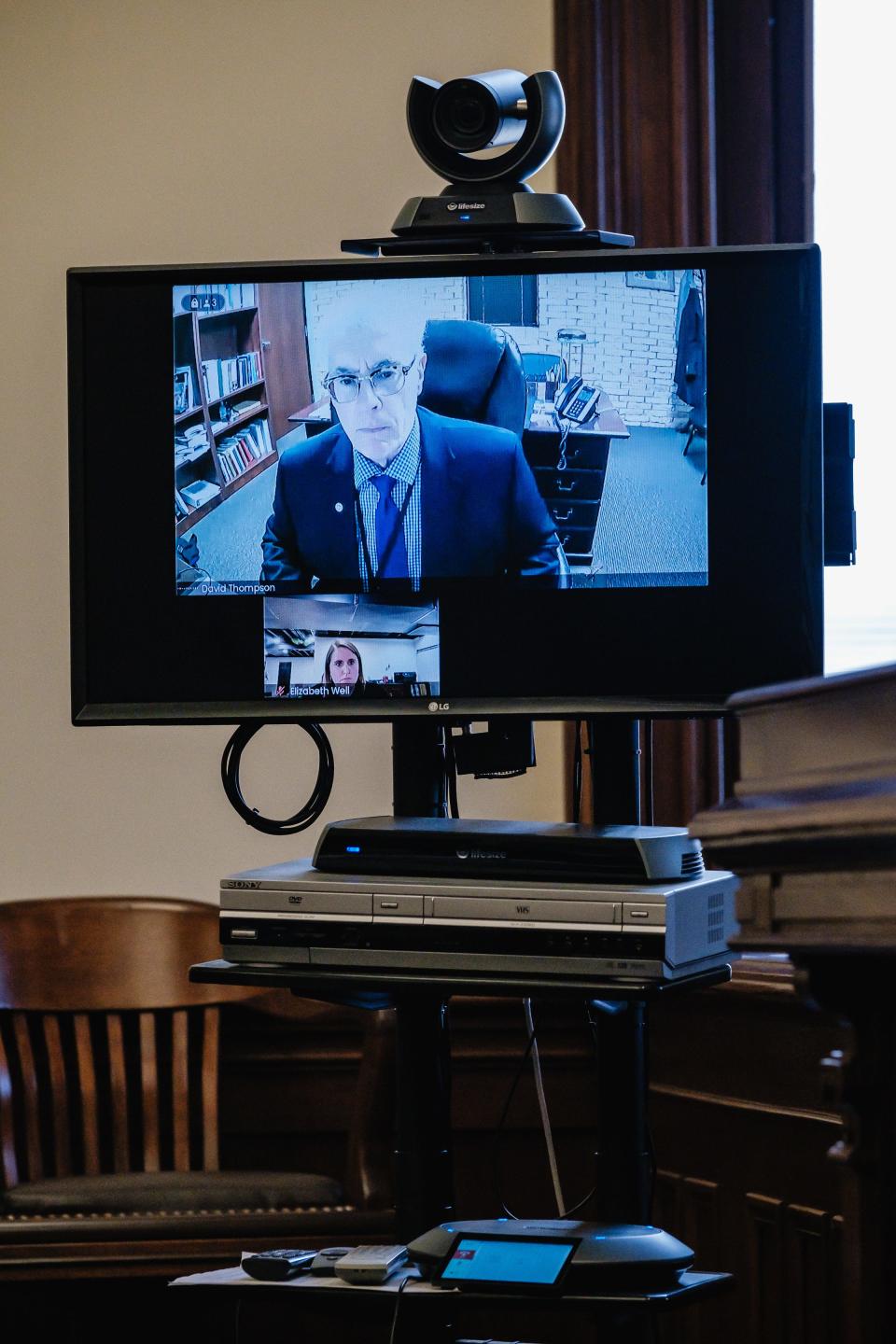 Appearing via video during a final pretrial hearing in the case against Justin D. McCauley are Dr. David Thompson, a licensed clinical psychologist, and Elizabeth Well, an attorney with the Ohio Crime Victim Justice Center.