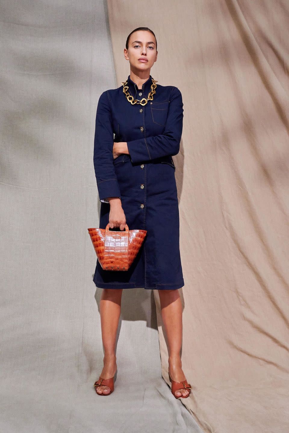 <p>Tod’s creative director Walter Chiapponi was inspired by the outdoors for his latest collection. But not just any outdoors: the manicured grounds of Villa Necchi Campiglio—aka the incredibly elegant Italian Rationalist mansion in Luca Guadagnino’s<em> I Am Love—</em>to be exact. So while we have the denims and khakis associated with long days spent outside, these looks have a decidedly polished Milanese vibe. It’s rich but casual, a difficult to achieve balance that lands on target in louche white suiting, dark denim dresses, oversized leather jackets, and lace up boots. —<em>Kerry Pieri</em></p>