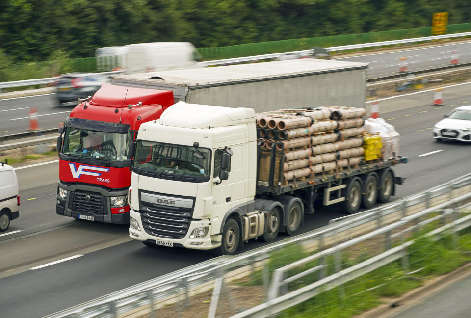 HGV lorries on the M4 motorway near Datchet, Berkshire. The Government has announced a temporary extension to lorry drivers' hours from Monday July 12th, amid a shortage of workers. Picture date: Thursday July 8, 2021.