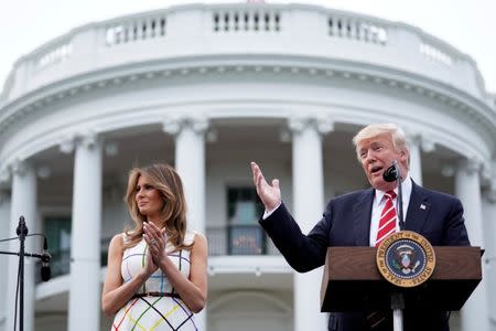 U.S. President Donald Trump delivers remarks as he hosts a Congressional picnic event, accompanied by First Lady Melania Trump, at the White House in Washington, U.S., June 22, 2017. REUTERS/Carlos Barria