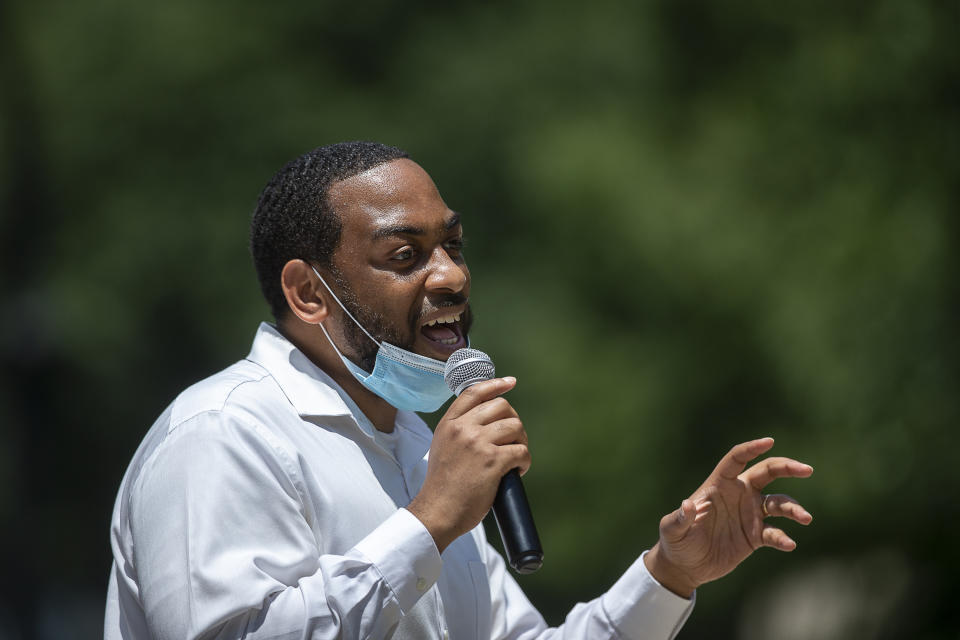In this June 22, 2020, photo, Senate candidate Charles Booker speaks at a campaign stop at Pikeville City Park in Pikeville, Ky. Yearning for change, a group of progressive Black Democratic congressional hopefuls is rushing toward the national stage, igniting rank-and-file enthusiasm in a party dominated by aging white leaders. (Ryan C. Hermens/Lexington Herald-Leader via AP)