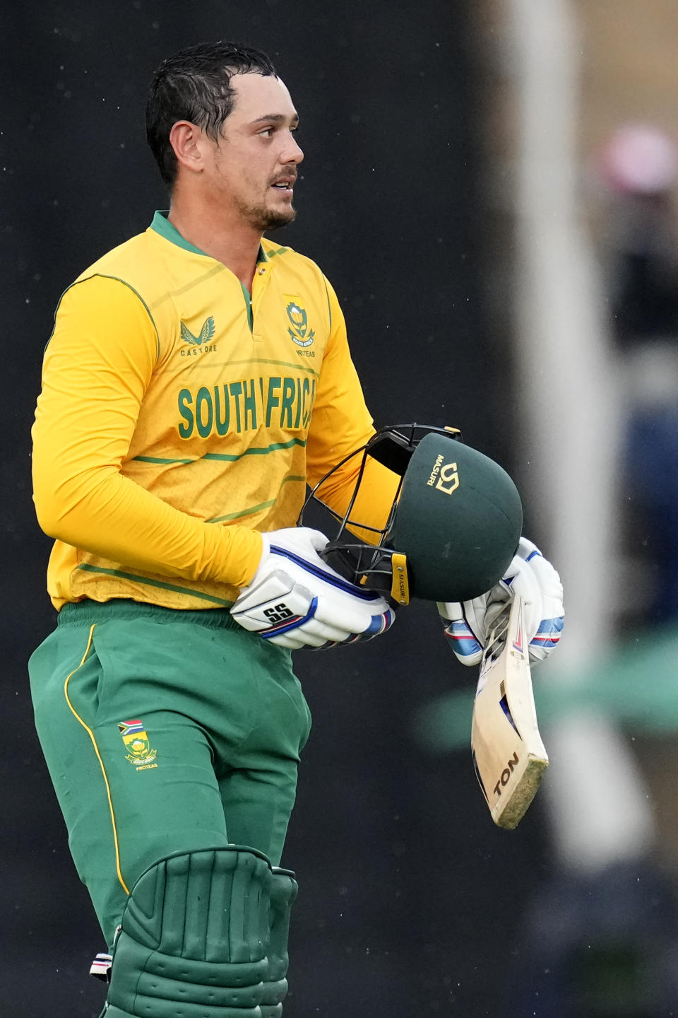 South Africa's Quinton de Kock celebrates his century during the second T20 cricket match between South Africa and West Indies, at Centurion Park, in Pretoria, South Africa, Sunday, March 26, 2023. (AP Photo/Themba Hadebe)