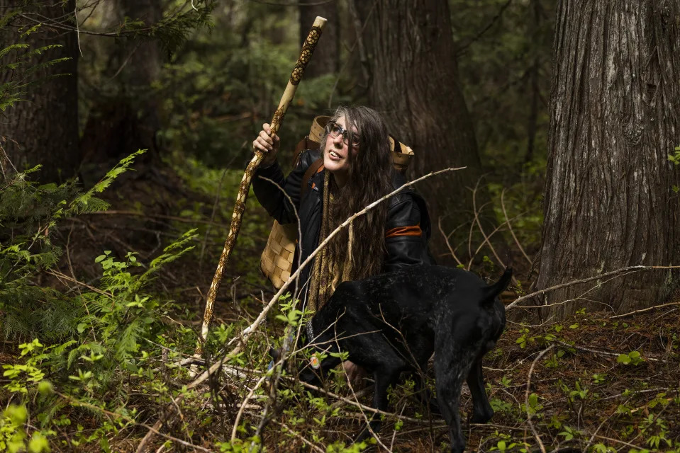 River Shannon Aloia, an avid forager, hunts for morels with her dog, Jasper, on national forest land near Missoula, Mont., May 17, 2024. Collecting wild mushrooms, berries and other foods from public forests and parks has become so popular that state and federal agencies have begun weighing more restrictions. (Tailyr Irvine/The New York Times)