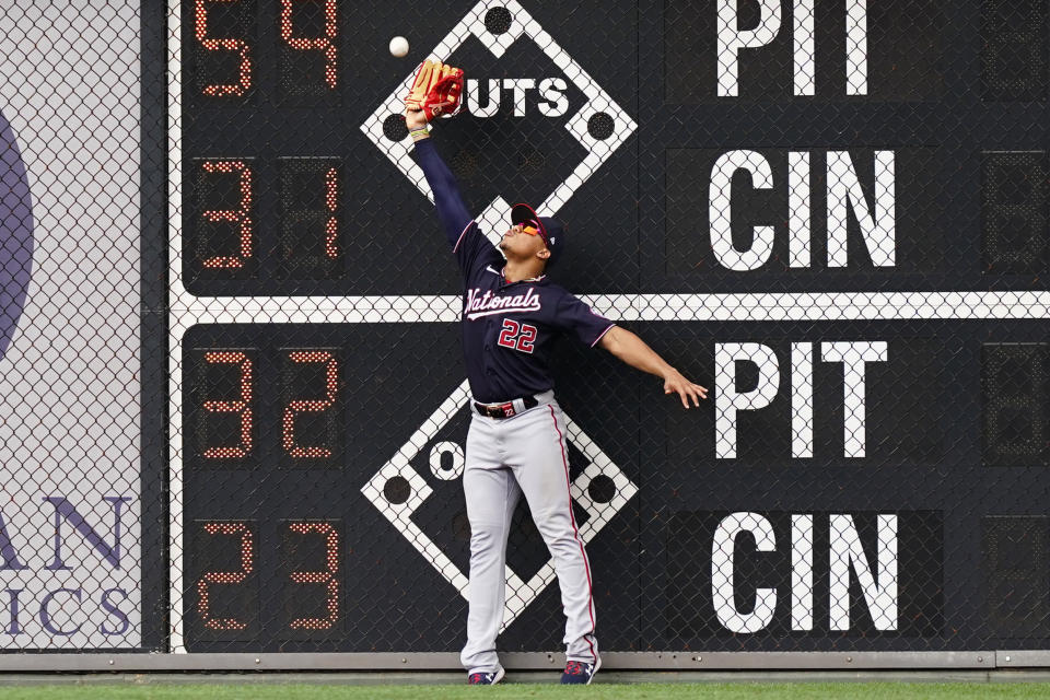 Washington Nationals right fielder Juan Soto cannot catch a run-scoring triple by Philadelphia Phillies' Didi Gregorius during the third inning of a baseball game, Thursday, July 7, 2022, in Philadelphia. (AP Photo/Matt Slocum)