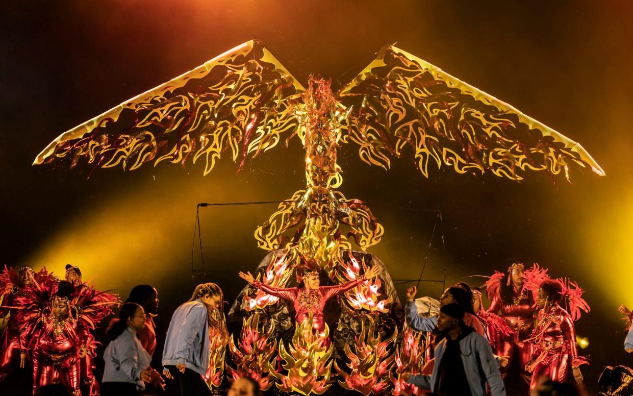 Carnival dancers perform on stage during The Awakening at Headingley Stadium, Leeds - PA