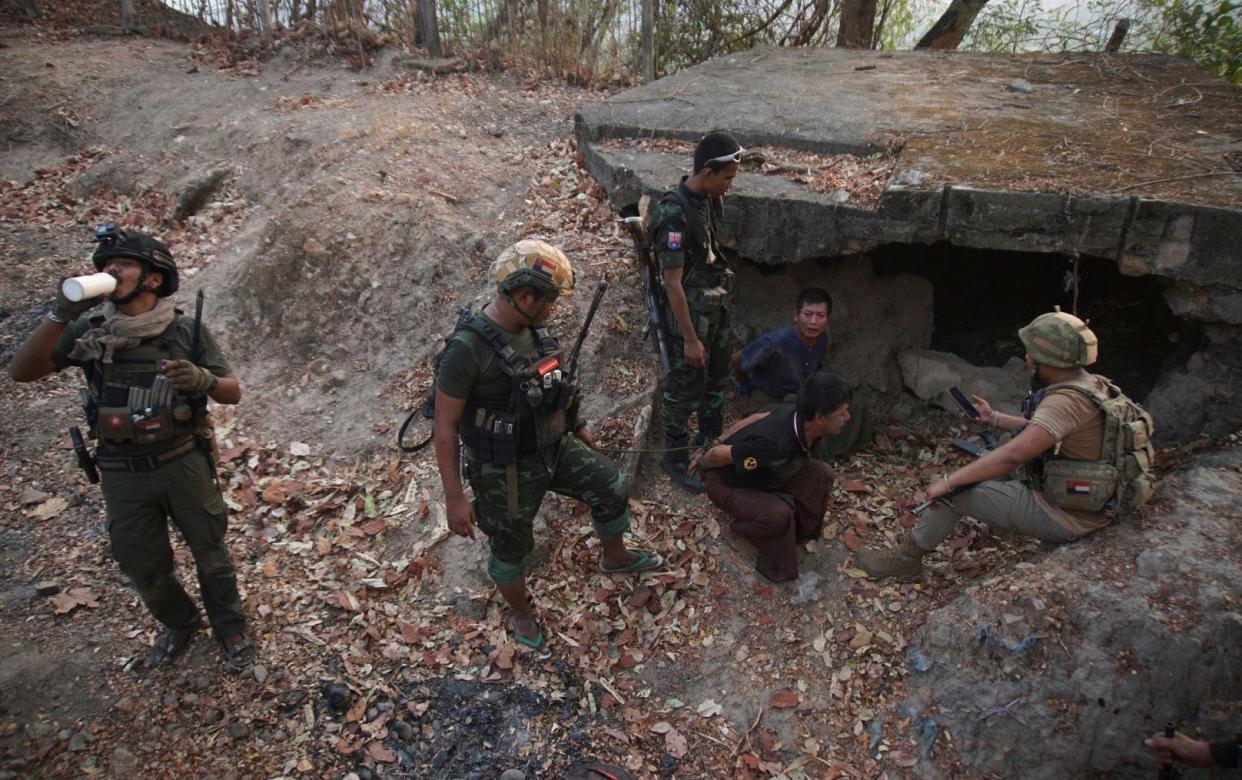 Members of the Karen National Liberation Army and People's Defense Force after they captured an army outpost in the southern part of Myawaddy township