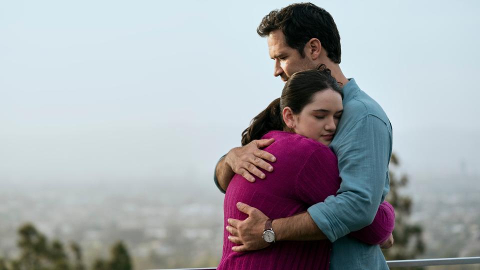 Krista Warner as Hayley hugging Manuel Garcia-Rulfo as Mickey in The Lincoln Lawyer