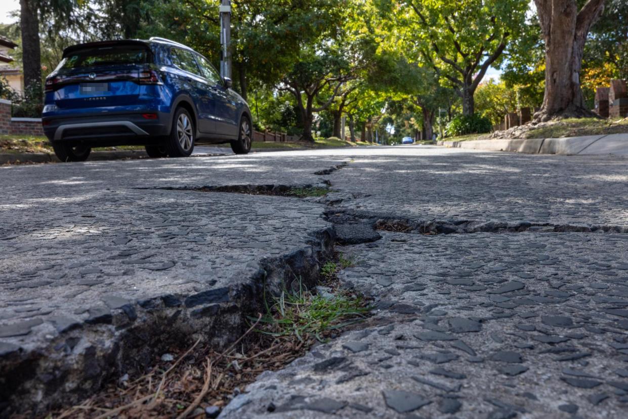 <span>Cracks in Christowel Street, Camberwell. Boroondara council has put plans to protect concrete roads ‘of heritage significance’ up for community consultation.</span><span>Photograph: Nadir Kinani/The Guardian</span>