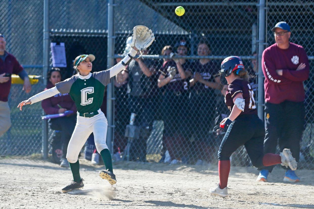 Cranston East second baseman Jaeda Viveiros stretches to come up with the play while covering first base on a bunt during Friday's win over Tiverton.