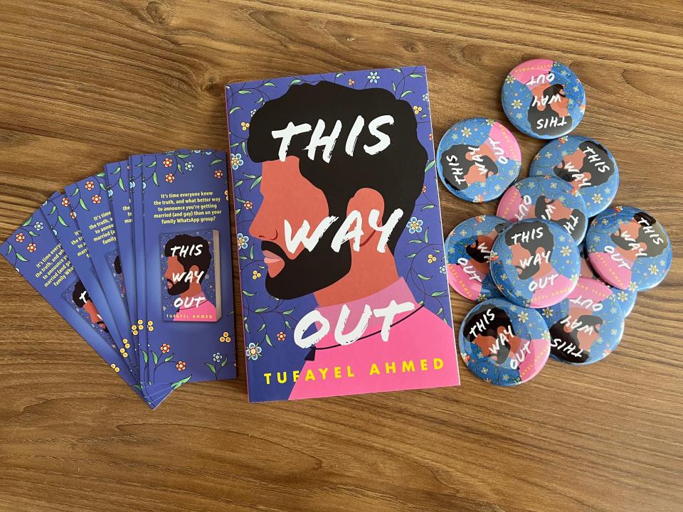 Image of "This Way Out" book and themed badges and bookmarks.