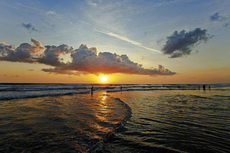 Sunset at Seminyak in Bali, Indonesia. (Photo: Getty)