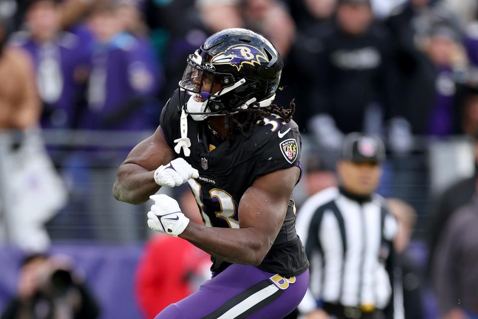 BALTIMORE, MARYLAND - DECEMBER 31: Running back Melvin Gordon III #33 of the Baltimore Ravens celebrates after rushing for a fourth quarter touchdown against the Miami Dolphins at M&T Bank Stadium on December 31, 2023 in Baltimore, Maryland. (Photo by Rob Carr/Getty Images)