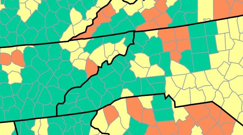 Centers for Disease Control and Prevention data shows community risk for counties. Green indicates a "low" risk for stress on local medical systems.