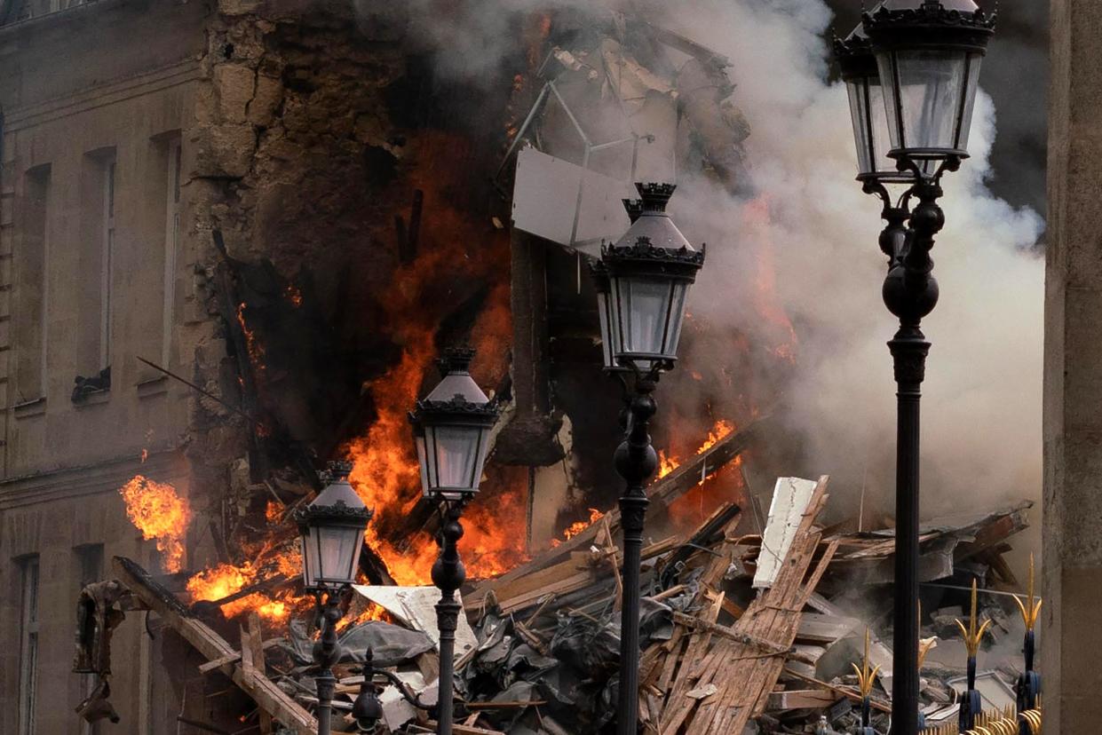 Smoke billows from the site of an explosion in central Paris (AFP via Getty Images)