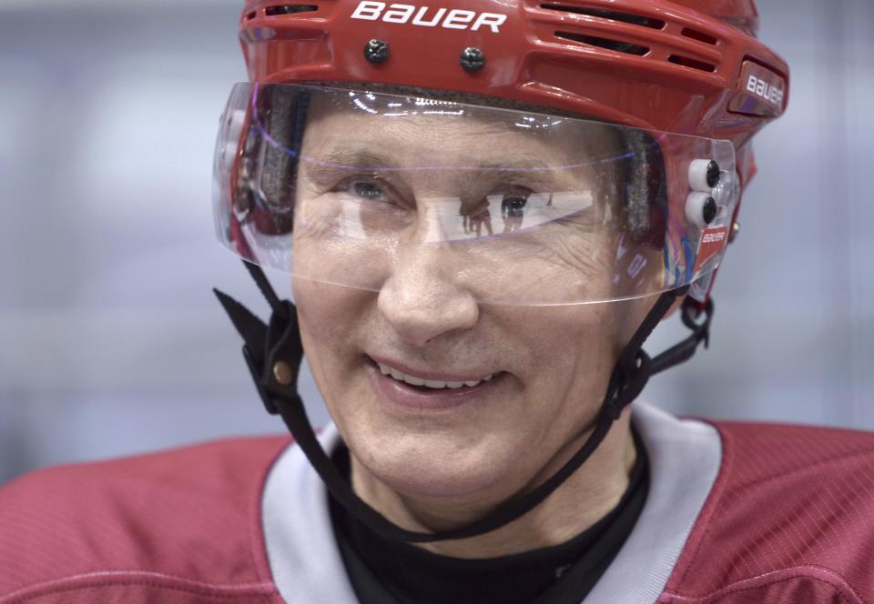 Russia's President Vladimir Putin takes part in a friendly ice hockey match in the Bolshoi Ice Palace near Sochi