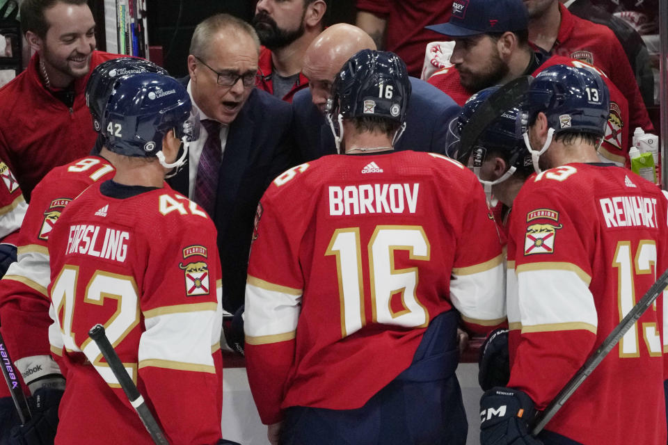 Florida Panthers head coach Paul Maurice talks to players during a time out in the third period of an NHL hockey game, Thursday, Oct. 19, 2023, in Sunrise, Fla. (AP Photo/Marta Lavandier)