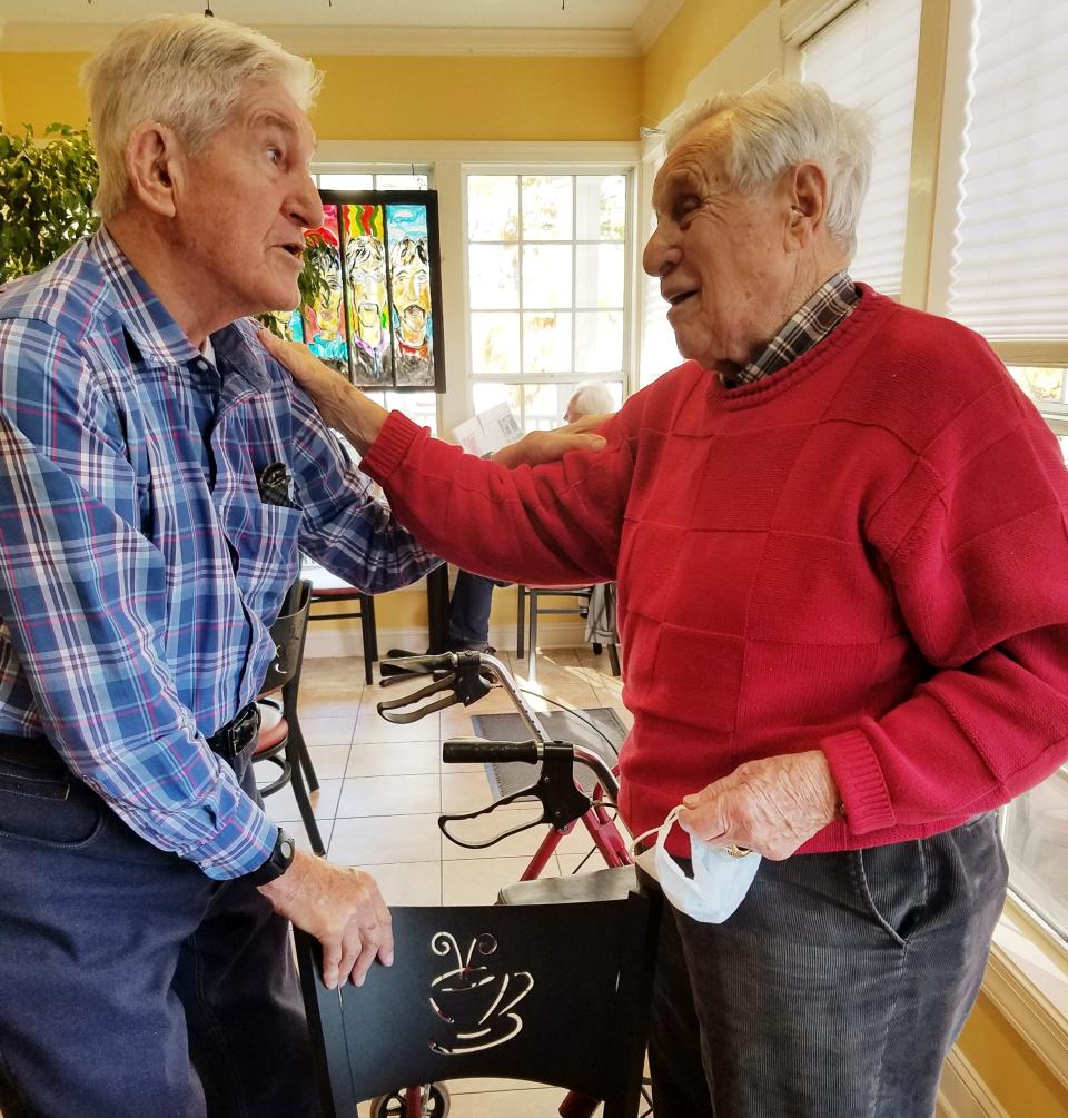 WWII veterans George Sarros, left, and Ed Cottrell meet for breakfast at Mean Mr. Mustard's recently.