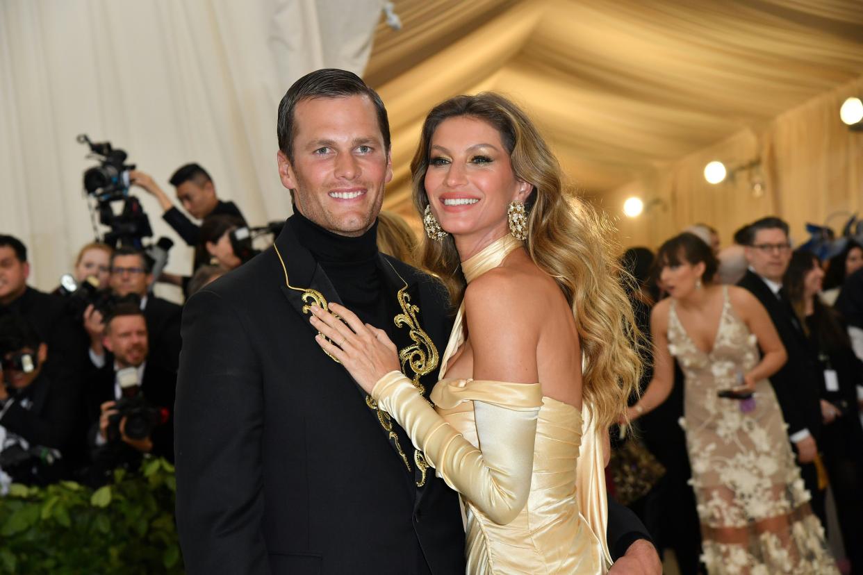 Tom Brady and Gisele Bundchen, here at the 2018 Met Gala, have reportedly hired divorce lawyers. 