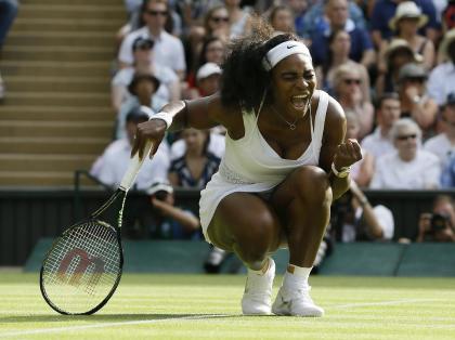 Serena Williams celebrates winning a point against Heather Watson. (AP)