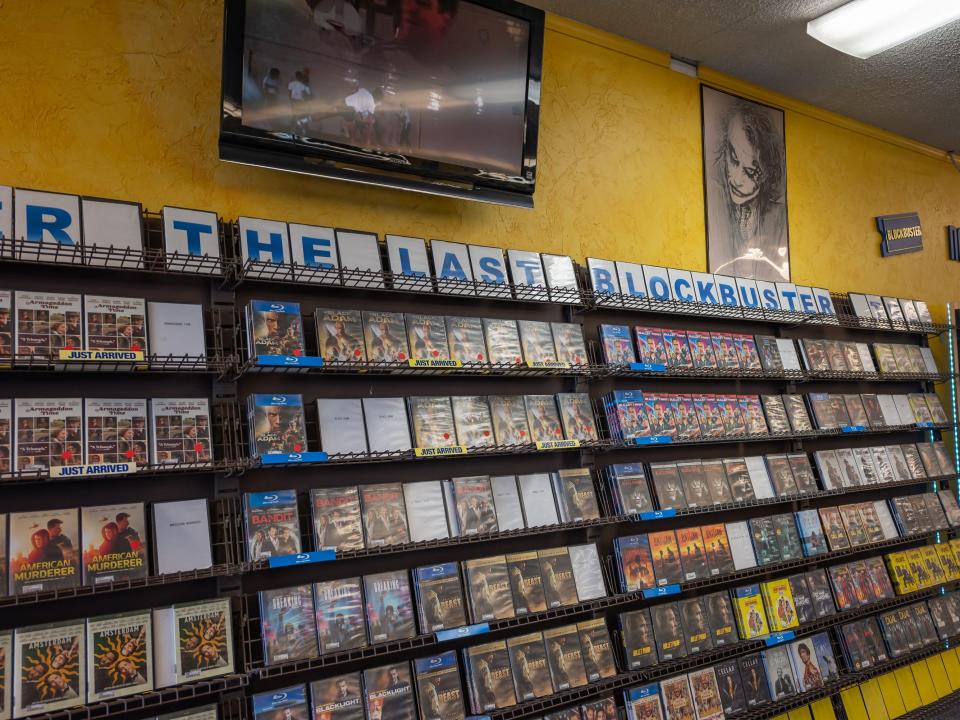 wall of movies at blockbuster