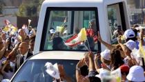 Pope Benedict XVI arrives in his popemobile to lead an open-air mass in the Lebanese capital Beirut. Pope Benedict XVI prayed on Sunday that Middle East leaders work towards peace and reconciliation, stressing again the central theme of his visit to Lebanon, whose neighbour Syria is engulfed in civil war