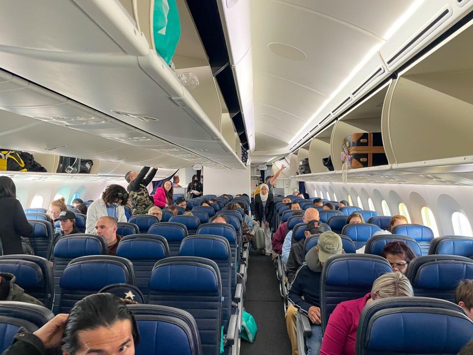 Economy class on a long-haul United flight to Tokyo.