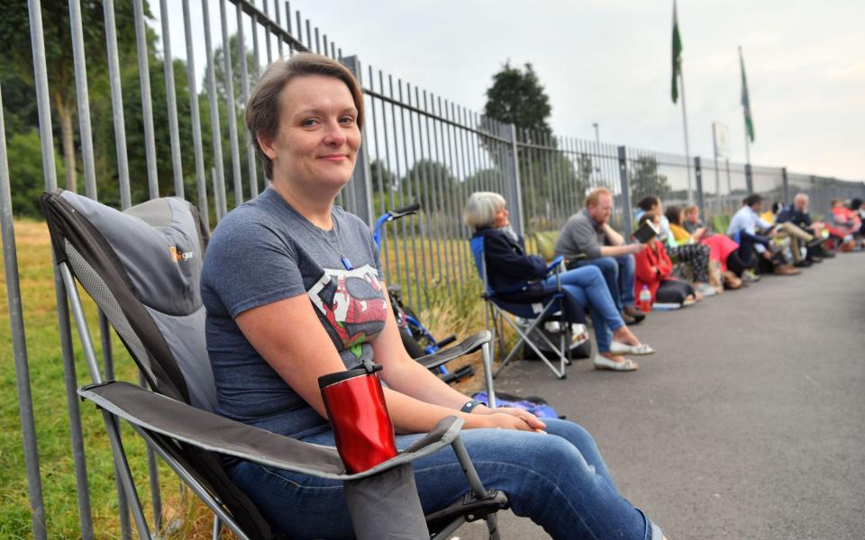 Parents queued outside Ysgol Y Berllan Deg school, Cardiff, for the breakfast club registration - Media Wales